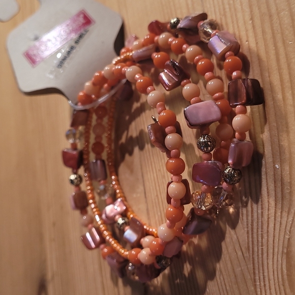 Pink bead and shell spiral bracelet - Picture 2 of 3